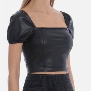 Avec Les Filles Faux leather crop top with puff sleeve and zip back. NWT